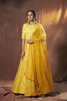 Yellow embroidered net semi stitched lehenga 2