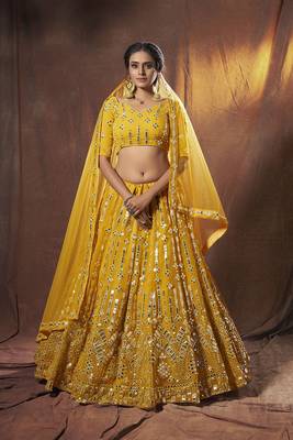 Yellow embroidered net semi stitched lehenga 1