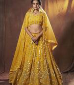 Yellow embroidered net semi stitched lehenga