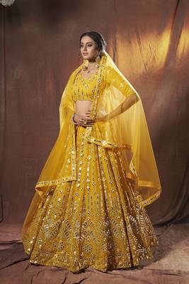 Yellow embroidered net semi stitched lehenga 2