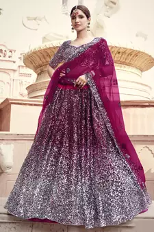 Glamorous Wine Colored Sequins embroidered Net Fabric Lehenga choli for wedding