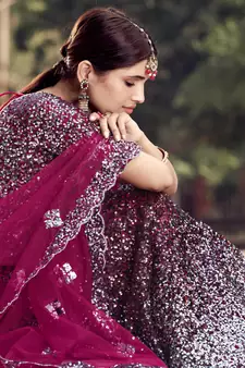 Glamorous Wine Colored Sequins embroidered Net Fabric Lehenga choli for wedding