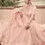 Peach embroidered net semi stitched Bridal lehenga