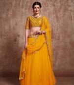 Mustard embroidered net semi stitched lehenga