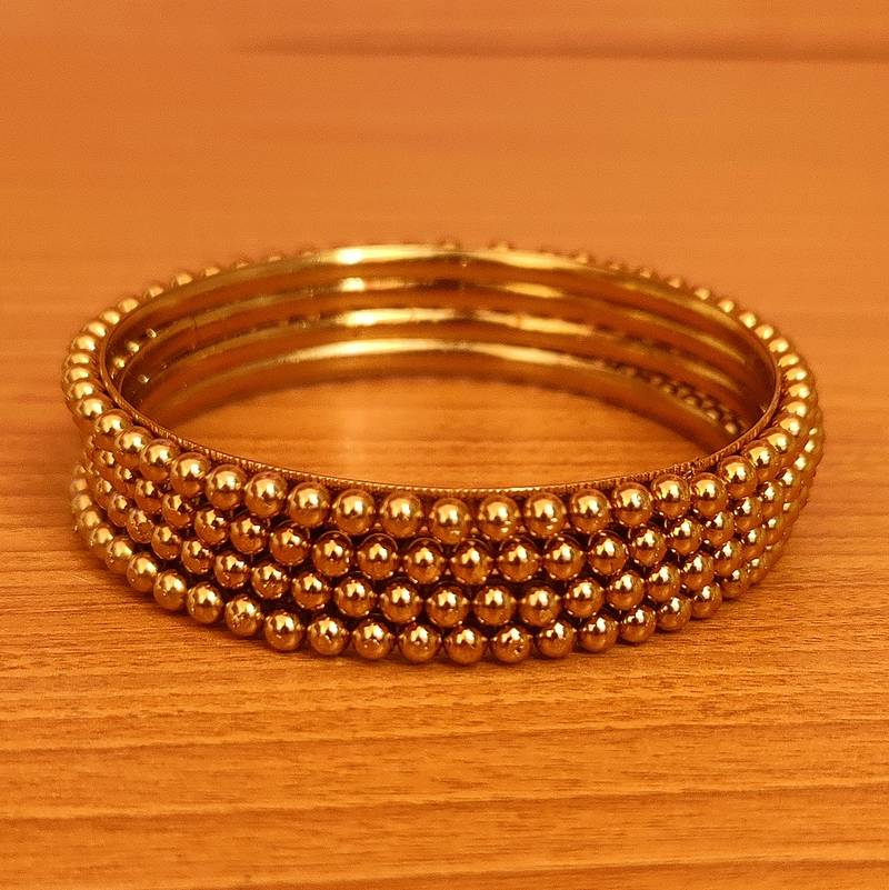 Gold bangles-and-bracelets
