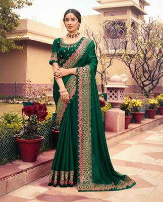 Dark green embroidered silk blend saree with blouse 1