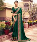 Dark green embroidered silk blend saree with blouse