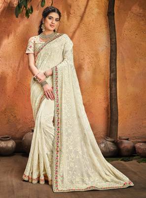 Off white embroidered pure georgette saree with blouse 1