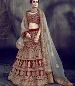 Maroon embroidered velvet semi stitched lehenga