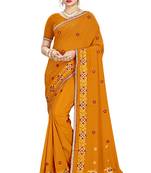 Mustard embroidered crepe saree with blouse