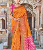 Orange embroidered silk saree with blouse