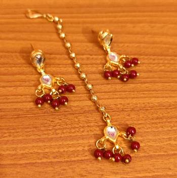 Maroon studs 1