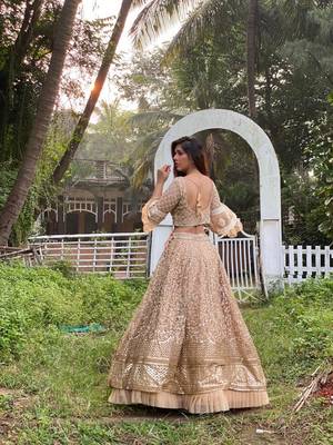 Beige embroidered net semi stitched lehenga 7