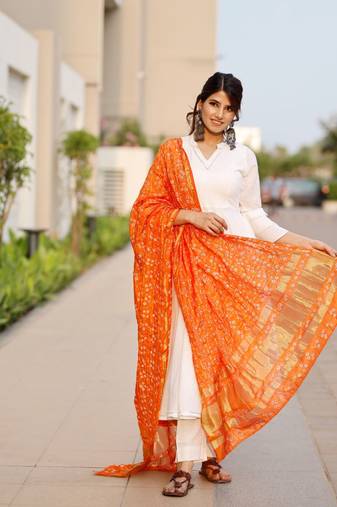 Bright white flared kurta set with bandej dupatta
