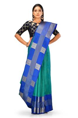 Green woven art silk saree with blouse 1