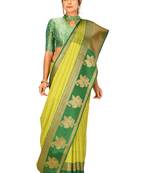 Light green woven art silk saree with blouse