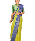 Light green woven art silk saree with blouse