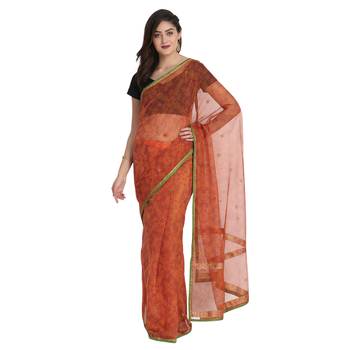 Orange printed net saree with blouse 1