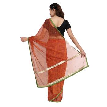 Orange printed net saree with blouse 2
