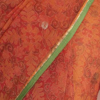 Orange printed net saree with blouse 4