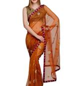 Mustard embroidered net saree with blouse
