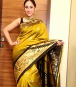 Yellow woven banarasi silk saree with blouse