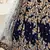 Delightful Navy-blue Zari, Sequins and Thread Embroidered velvet fabric lehenga choli for bride