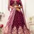 Engaging Purple Zari, Sequins and thread embroidered velvet fabric lehenga choli for dulhan