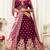 Engaging Purple Zari, Sequins and thread embroidered velvet fabric lehenga choli for dulhan
