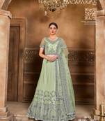Green plain net semi stitched lehenga