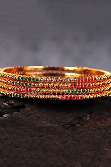 Gold Plated Stone Studded Set of Four Bangles