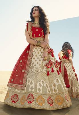 Cream thread embroidery silk semi stitched lehenga 1