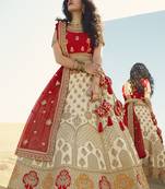 Cream thread embroidery silk semi stitched lehenga