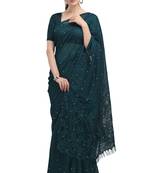 Green woven silk saree with blouse