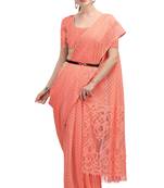 Peach woven silk saree with blouse