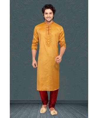 Mens yellow jacqurd kurta set with marron cording and emb on jabbapatti and colour and golden buttons 1