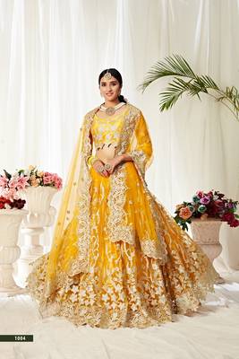 Yellow embroidered net semi stitched lehenga 1