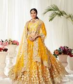 Yellow embroidered net semi stitched lehenga