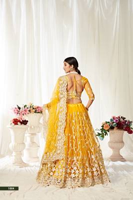 Yellow embroidered net semi stitched lehenga 2
