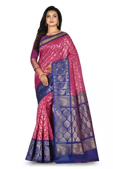 Pink woven silk blend saree with blouse