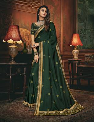 Green embroidered silk blend saree with blouse 1