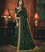 Green embroidered silk blend saree with blouse