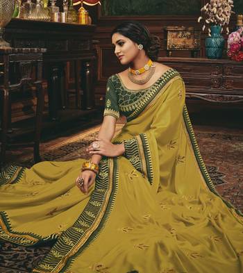 Mustard embroidered silk blend saree with blouse 2