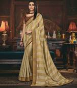 Beige embroidered silk blend saree with blouse