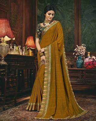 Brown embroidered silk blend saree with blouse 1