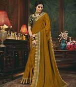 Brown embroidered silk blend saree with blouse
