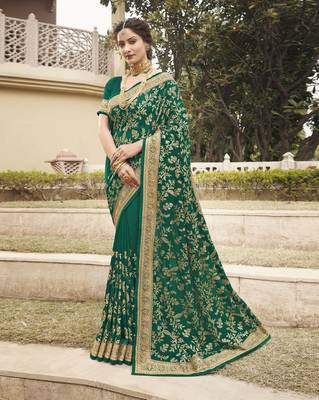 Green embroidered silk blend saree with blouse 1