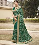 Green embroidered silk blend saree with blouse