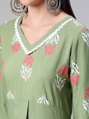 Green printed rayon kurtas-and-kurtis 4