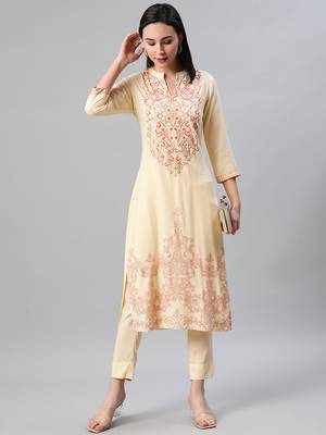 Cream printed rayon kurtas-and-kurtis 5